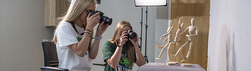 photo of two students in a photography studio