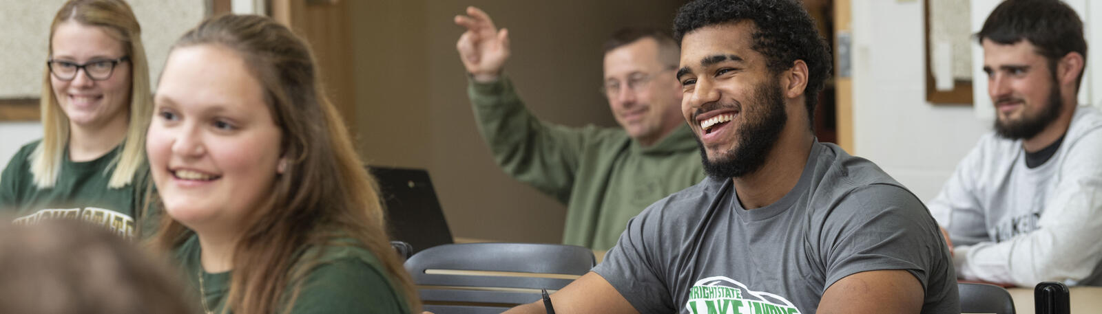 photo of smiling students in a classroom at lake campus